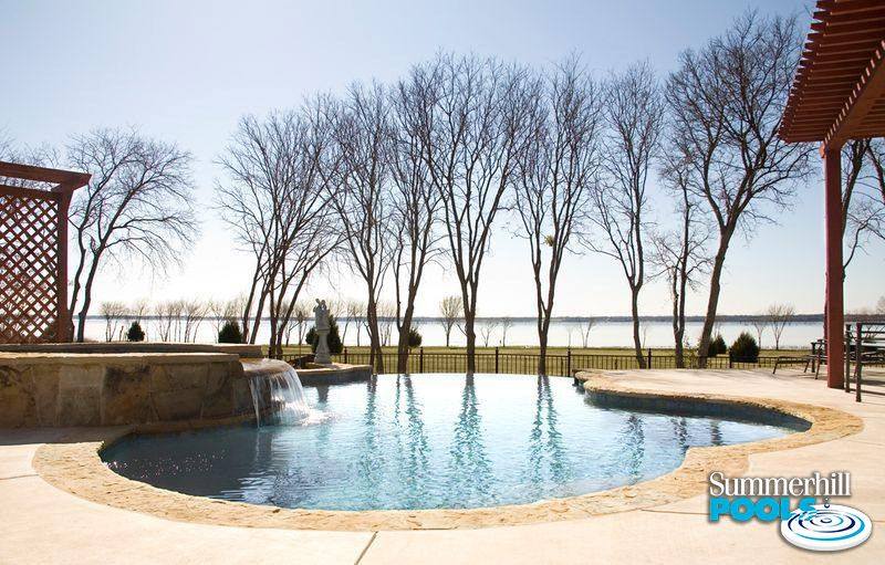 infinity pool over looking a lake