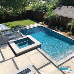 modern pool with concrete pavers