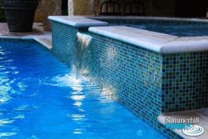 glass tile spa with water feature