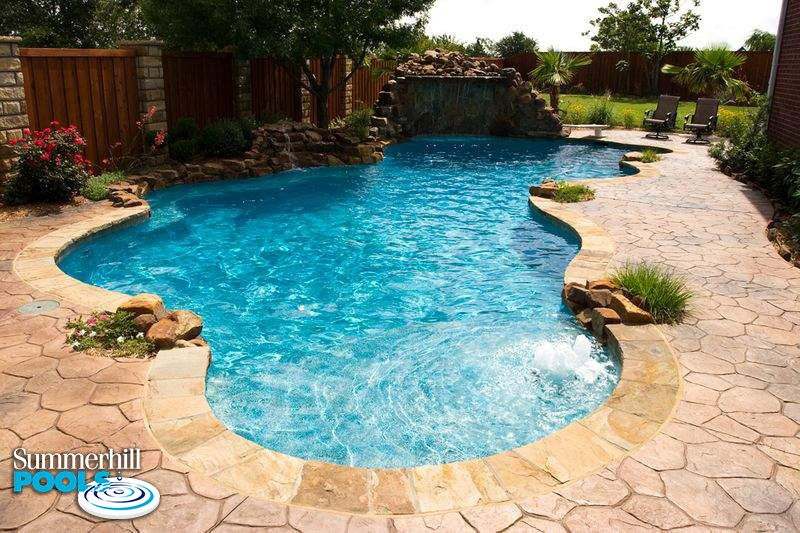 Freeform pool with rock waterfall