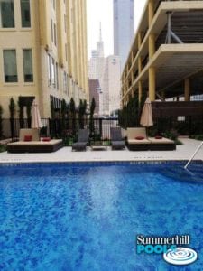 dallas hilton hotel pool with lounge chair