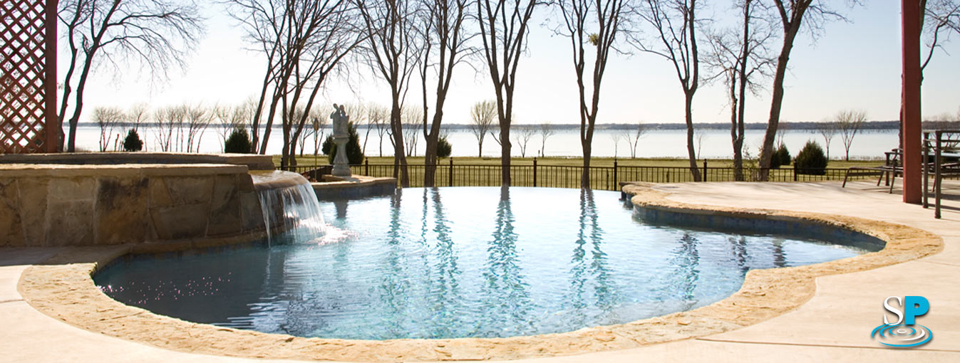infinity pool over looking a lake