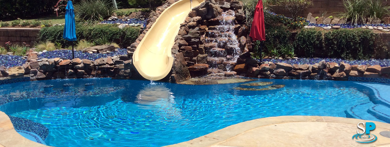 lagoon pool with waterfall and slide