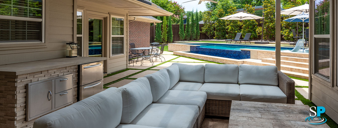 outdoor kitchen and seating area