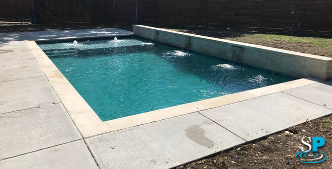 concrete decking around a pool

