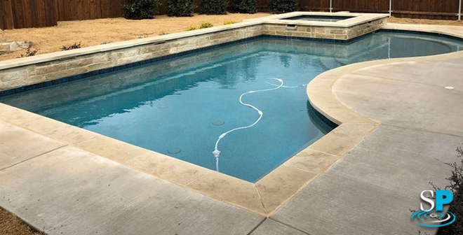 concrete decking around a pool
