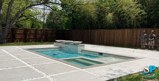 concrete deck pavers around a pool