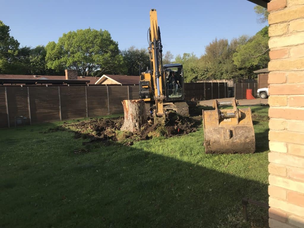 Our excavators have interchangeable lift mechanisms that can be added or removed. We change these mechanisms depending on the task at hand. In this instance, we switched our large drum for a smaller more precise unit to work around this large tree stump. We take the time necessary to accurately work around our job sites and ensure properly work every time!