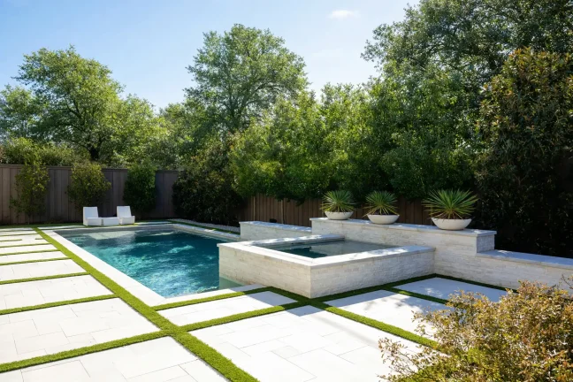 Detailed backyard pool staking and layout showing the planned placement of the pool shell, plumbing lines, and temporary electrical service relative to the home's architecture.
